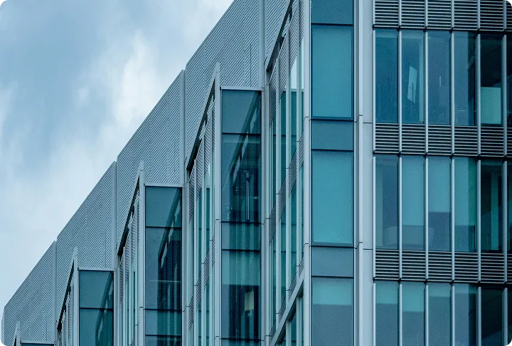 Modern building used to illustrate the company on VidMage’s About page